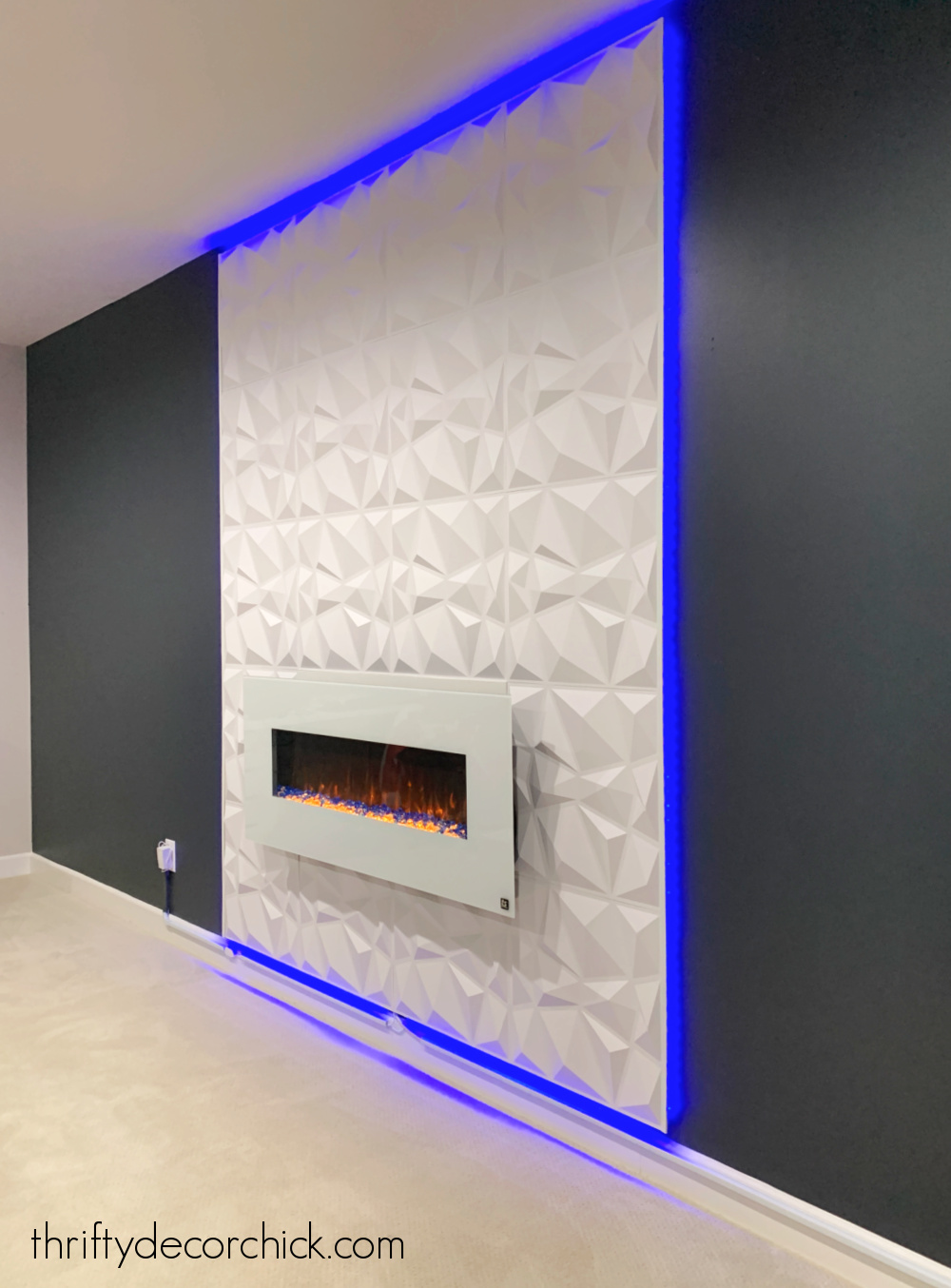 light strips behind fireplace wall