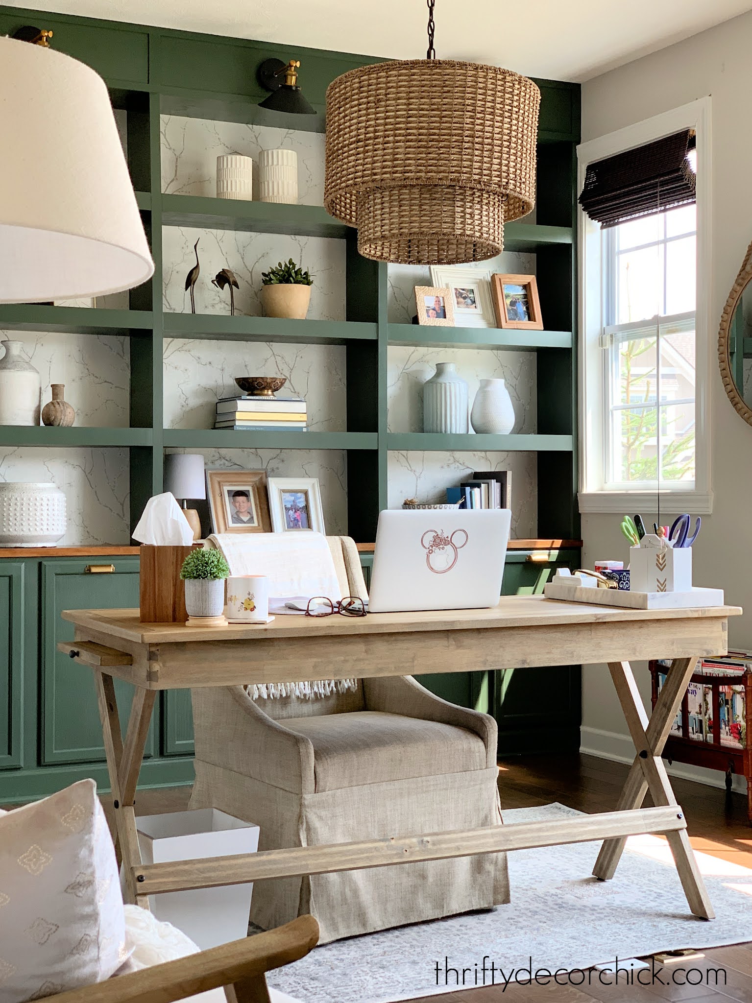 green bookcases in office