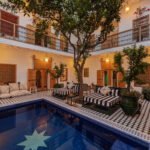 Golden hour courtyard Riad Botanica Marrakech scaled